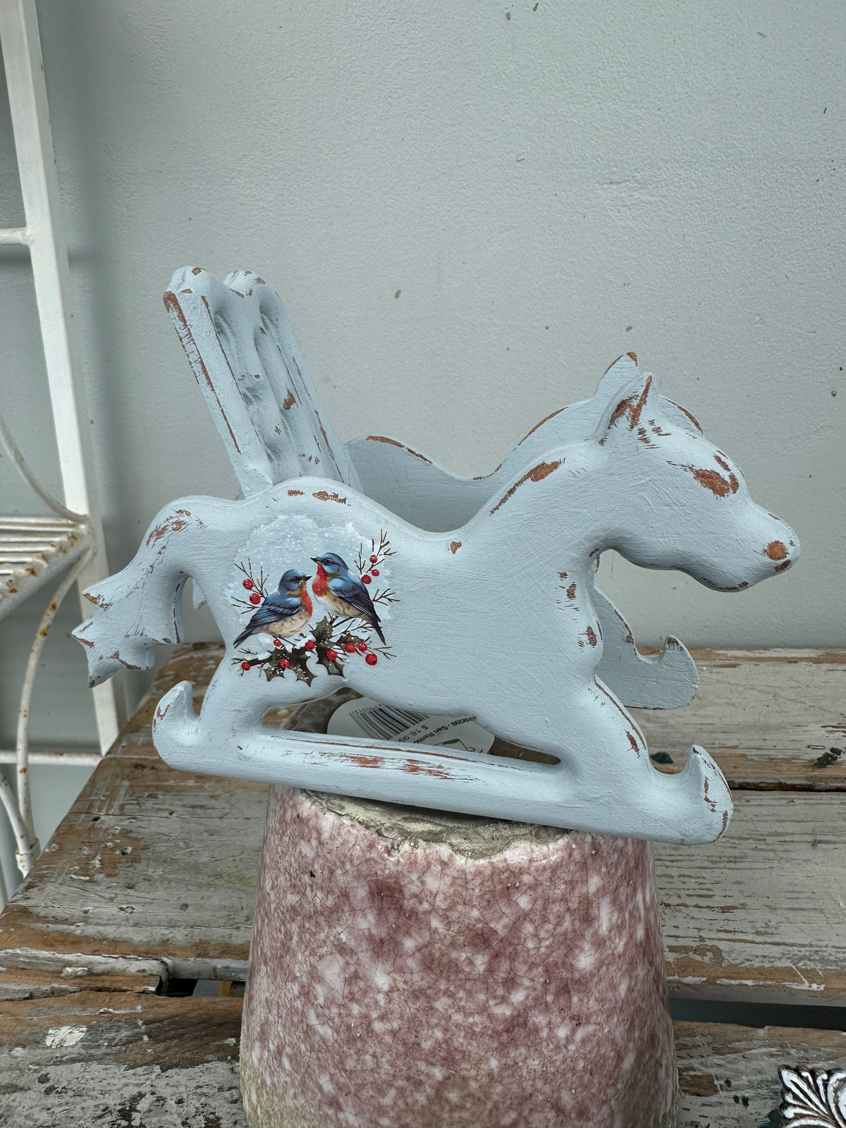 Small blue rocking horse