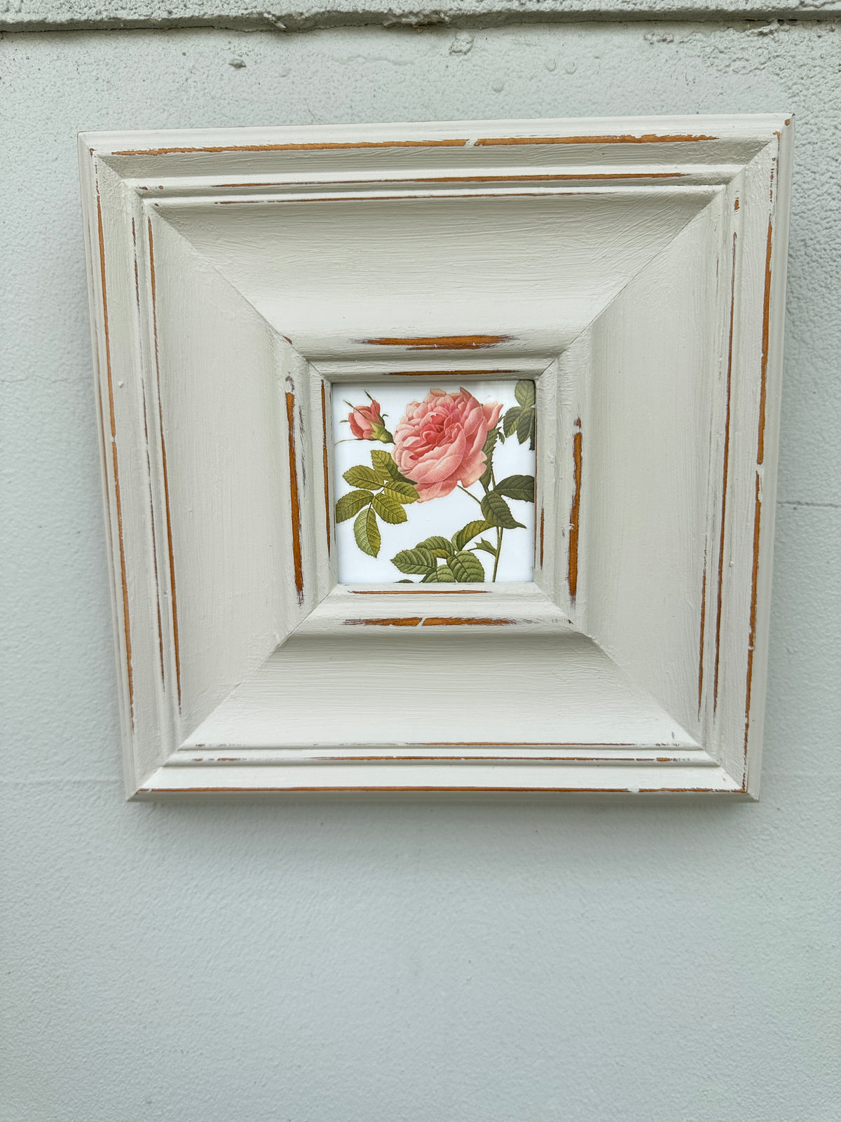 Floral picture in chunky grey frame