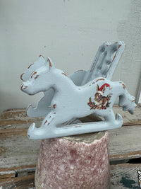 Small blue rocking horse