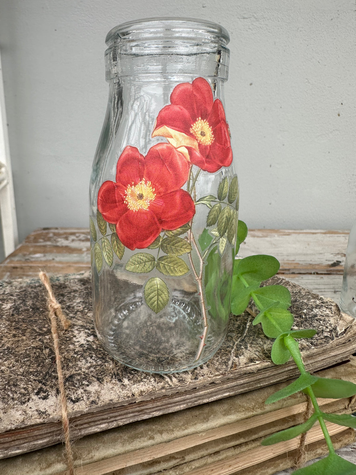 Glass bottle with red floral- ex the PMV studio