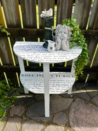 Two tiered half round table in black and white