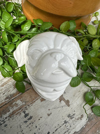 White ceramic dogs head wall art frenchie