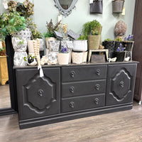 This old sideboard was covered in paint sploshes as it has been used in our classroom for the last few years as storage. Time to pull her out and spruce her up. She looks very rustic elegant now and still has great storage potential!