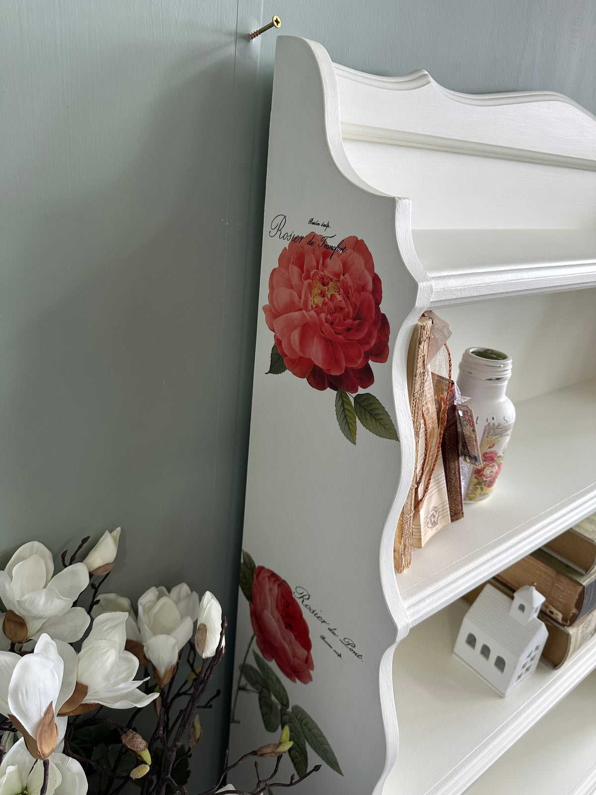 Red Roses and White Bookshelf display