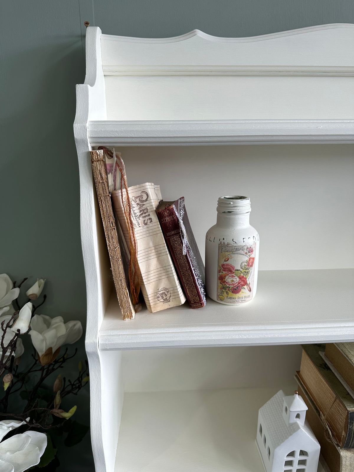 Red Roses and White Bookshelf display