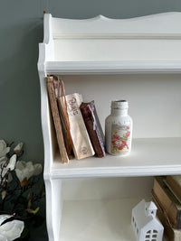 Red Roses and White Bookshelf display